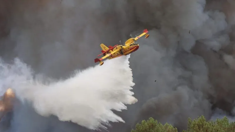 Thousands of firefighters and volunteers battle France wildfires as extreme heat fuels dangerous flames