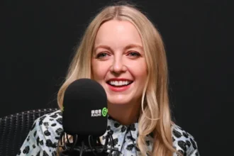 Lauren Laverne Reveals Smouldering Myeloma Diagnosis, Says She Feels Well Television and radio presenter Lauren Laverne has shared that she has been diagnosed with smouldering myeloma, a rare blood and bone marrow disorder that can sometimes develop into blood cancer. Despite the diagnosis, she reassured fans that she currently feels well and does not need medical treatment. The 48 year old broadcaster explained that the condition has no symptoms in her case. Doctors will continue to monitor her health through regular blood tests, MRI scans, and bone marrow examinations. She also said that the chance of the condition progressing into blood cancer is considered low. A Condition Found During Routine Monitoring Lauren Laverne revealed that doctors discovered the disorder during routine medical monitoring following her previous cancer diagnosis. She said the condition is unrelated to her earlier illness or a recent surgery. According to Laverne, many people with smouldering myeloma never realize they have it because it often causes no symptoms. Cancer survivors are more likely to receive an early diagnosis because they usually undergo regular health checks. Living With a Chronic Blood Disorder Although there is currently no cure for smouldering myeloma, Laverne said she does not require treatment at this stage. However, she explained that the condition slightly weakens her immune system, making regular medical monitoring essential. She admitted that receiving another serious diagnosis within two years has been emotionally challenging. Even so, she remains positive and hopes that sharing her experience will encourage others facing similar health issues. Message About Early Detection Laverne praised her family doctor for investigating her ongoing low iron levels instead of dismissing them. She encouraged people to speak up about persistent health concerns and seek specialist advice if something does not feel right. She believes early diagnosis can make a significant difference and urged others to advocate for their own health by asking questions and requesting further tests when necessary. Taking a Short Break Before Returning The presenter said she plans to take a short holiday before returning to work as usual. She also sent her support to everyone living with similar conditions and thanked those who have supported her throughout her health journey. Her announcement has drawn widespread messages of encouragement from fans and colleagues, who wished her good health and a smooth recovery.
