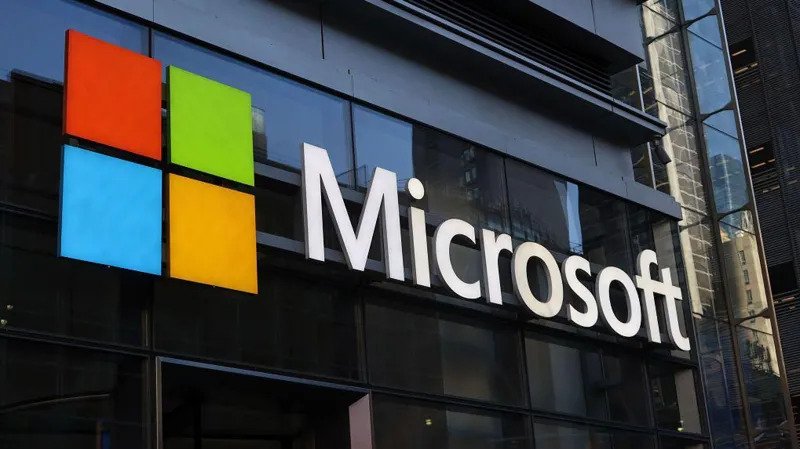 Microsoft Cuts 4,800 Jobs as Xbox Undergoes Major Restructuring Xbox Faces Its Biggest Internal Shake Up Microsoft has announced a major workforce reduction, cutting around 4,800 jobs across the company. The decision affects about 2.1% of its global employees. Xbox will experience one of the biggest impacts, with thousands of positions being removed as part of a large restructuring plan. Company leaders say the move will help Microsoft adjust to changing customer needs and prepare for future growth in a rapidly evolving technology industry. More Than 3,200 Xbox Jobs to Be Eliminated Xbox will immediately eliminate more than 1,600 jobs. The company also plans to remove another 1,600 positions over the next year. According to Xbox Chief Executive Asha Sharma, this marks the biggest restructuring in the gaming division's history. She explained that the changes are designed to build a stronger and more competitive Xbox rather than reduce its long term ambitions. Sharma said successful companies must continue adapting instead of assuming their past achievements will guarantee future success. Four Xbox Studios to Become Independent As part of the restructuring, Microsoft will separate four game development studios from Xbox. The studios include: Compulsion Games Double Fine Productions Ninja Theory Undead Labs The company believes this change will allow Xbox to focus on its future priorities while giving these studios greater flexibility. Microsoft Focuses on Future Growth Microsoft Executive Vice President Amy Coleman told employees that the technology industry is changing quickly. She said businesses must adapt if they want to continue serving customers successfully. Coleman also addressed questions about artificial intelligence. She explained that AI is changing how work gets done across the company. However, she clarified that AI is not directly replacing the jobs affected by these layoffs. Microsoft says its goal is to simplify operations and invest in areas that offer the greatest value for customers and long term growth. Gaming Industry Continues to Face Challenges The gaming industry has experienced widespread job losses over the past few years. Many developers have reduced staff as companies adjust to rising development costs and changing market conditions. Last year, Xbox cut more than 2,000 jobs and closed four studios after completing its acquisition of Activision Blizzard. Earlier this year, Microsoft also announced plans to reduce up to 9,000 additional positions while continuing to invest billions of dollars in artificial intelligence infrastructure and technology. What This Means for Xbox The latest restructuring signals another major shift for Xbox as Microsoft reshapes its gaming business. Although thousands of jobs are being eliminated, company executives insist these changes are intended to strengthen Xbox's future and improve its ability to compete in the global gaming market. Industry experts will closely watch how the restructuring affects upcoming games, studio operations, and Microsoft's long term gaming strategy.