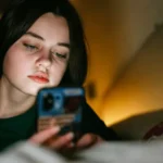 The UK government plans a midnight social media curfew for 16 and 17 year olds while limiting addictive app features to improve sleep, focus, and online safety.