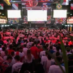 Police urge England fans to follow positive World Cup behaviour after more than 500 football related incidents and 100 arrests in the UK.