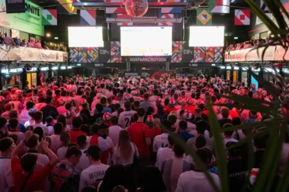 Police urge England fans to follow positive World Cup behaviour after more than 500 football related incidents and 100 arrests in the UK.