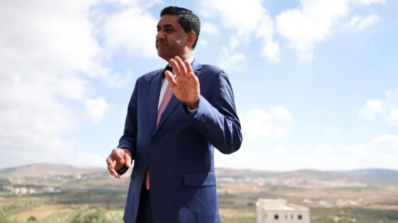 US Democrat Ro Khanna Says He Was Detained by Armed Israeli Settlers in West Bank Ro Khanna’s West Bank Visit Turns Into Detention Incident US Congressman Ro Khanna said he was detained for around 90 minutes by armed Israeli settlers during a visit to the occupied West Bank. Khanna said the incident happened on Wednesday while he was travelling with his team near Turmus Ayya, close to Ramallah. According to his statement, several settlers carrying M4 rifles surrounded their vehicle and blocked their movement. The congressman said the situation continued even after Israeli forces arrived. He claimed that the soldiers supported the settlers instead of helping his group leave the area. Khanna Describes Encounter With Armed Settlers In a statement shared on social media, Khanna said he was visiting the ruins of Khirbet Zanuta as part of a fact finding trip. He wanted to examine the effects of Israeli occupation and the impact on Palestinian communities. Khanna said the area had suffered major damage, including the destruction of a village school. He claimed that armed settlers arrived and stopped their vehicle while they were inspecting the location. During the detention, Khanna’s team contacted the US Embassy in Jerusalem for assistance. He said they were released later after police officers arrived and helped end the situation. Israeli Military Responds to Claims The Israeli military said troops and police officers responded after receiving reports that settlers had blocked vehicles in the area. According to the military, officers arrived at the scene, separated the Israeli civilians, and allowed the vehicles to continue their journey. The military has not accepted Khanna’s description of the incident and said its forces acted to resolve the situation. Background of West Bank Settlements Israel has established around 160 settlements in the West Bank and East Jerusalem, where approximately 700,000 Jewish settlers live. Palestinians consider these areas part of a future independent state. Around 3.3 million Palestinians also live in the West Bank alongside these settlements. Many countries and international organizations consider Israeli settlements in the occupied West Bank illegal under international law, while Israel disputes this position. Political Future of Ro Khanna Ro Khanna, a Democratic member of the US House of Representatives, has gained attention for his views on foreign policy issues. He is also considered a possible candidate for the 2028 US presidential race. The incident during his West Bank visit has added further attention to discussions about Israeli settler activity, Palestinian communities, and US involvement in the region.