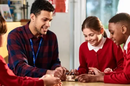 Teachers in England to Receive 3.5% Pay Rise From September Teachers across England will receive a 3.5% pay rise from September, with another 3% increase planned for the following year, according to the Department for Education. The government says the decision reflects its commitment to supporting teachers while also providing additional funding for schools. The government has allocated £1.8 billion in extra funding for education. However, schools will need to cover the first 1% of each pay increase from their existing budgets. Officials believe this approach will help balance higher salaries with responsible public spending. Government Introduces New Rules on Academy Executive Pay Alongside the pay announcement, the government has introduced new measures to limit the salaries of senior leaders in academy trusts. From September, academy trusts must seek government approval before advertising executive roles with salaries above £174,000. In addition, academy executives will no longer be allowed to receive pay rises that exceed those given to classroom teachers. Education Secretary Bridget Phillipson said teachers deserve fair recognition for the work they do every day. She also said executive salaries should not grow faster than teachers' pay and explained that the new rules will help prevent excessive pay increases for senior leaders. Teaching Union Still Considering Strike Action Despite the pay award, the National Education Union (NEU) has not ruled out industrial action. The union had previously warned that it would hold a formal strike ballot in the autumn if the government failed to improve its original pay proposal. Following the latest announcement, an NEU spokesperson said the union is still reviewing its options. General Secretary Daniel Kebede argued that the pay increase does not fully address the financial pressure facing schools. He said schools will still have to find part of the funding from their existing budgets, which could lead to spending cuts in other areas. According to Kebede, the union believes education should receive full funding instead of asking schools to absorb additional costs. The NEU's national executive committee is expected to meet next week to decide its next steps. Former Teacher Says Wellbeing Is the Bigger Challenge Former primary school teacher Jessica Featonby, who now runs an education technology company, welcomed higher salaries but said pay alone will not solve the challenges facing the profession. She explained that many teachers regularly work early mornings, evenings, weekends, and even school holidays without additional pay. In her view, reducing workload and improving staff wellbeing are just as important as increasing salaries. Featonby believes better working conditions would encourage more teachers to stay in the profession and help schools improve long term staff retention. What the Pay Rise Means The latest pay settlement offers teachers a higher salary over the next two years while introducing tighter controls on executive pay in academy trusts. However, concerns remain over how schools will fund part of the increase, leaving ongoing debate between the government and teaching unions about the future of education funding in England.