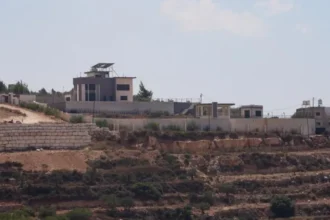 Israeli settlers besieging Palestinian families in West Bank village