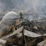 The governor of the Tula region of Russia, Dmitry Milyaev, announced on Wednesday that a drone had crashed into a Wildberries warehouse in the area overnight, starting a fire. According to the store, firefighting crews were at the scene and the facility had been evacuated in advance. He stated on Telegram that one person had been hurt and no fatalities had been recorded. Warehouses, particularly those run by Wildberries, have been attacked by Ukraine on several occasions. The latest attacks on warehouses in the Moscow region on Tuesday morning resulted in five fatalities and ten injuries. The previous day, a drone struck a crowded beach in the southern Krasnodar area, killing seven people and injuring fifty-eight more, according to Russian officials.
