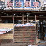 Typhoon Saudel affecting China's eastern coast with severe weather and travel disruptions