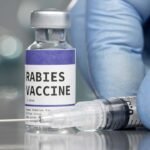 Healthcare professional preparing rabies vaccine for post exposure treatment