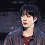 BTS Jin performs during the 2026 iHeartRadio Music Festival in Las Vegas.