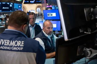U.S. stock market trading after a strong jobs report raises concerns about higher Federal Reserve interest rates.