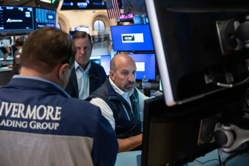 U.S. stock market trading after a strong jobs report raises concerns about higher Federal Reserve interest rates.