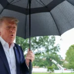 Donald Trump speaks with reporters as the U.S. prepares for an AI meeting with technology leaders.