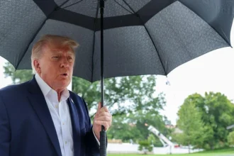 Donald Trump speaks with reporters as the U.S. prepares for an AI meeting with technology leaders.