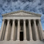 U.S. Supreme Court building as the justices begin a new term featuring major cases on climate change, immigration, voting rights and religious freedom.