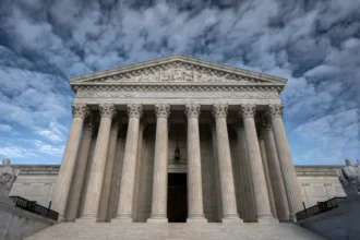 U.S. Supreme Court building as the justices begin a new term featuring major cases on climate change, immigration, voting rights and religious freedom.