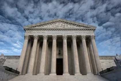 U.S. Supreme Court building as the justices begin a new term featuring major cases on climate change, immigration, voting rights and religious freedom.