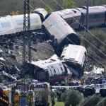 Emergency crews work at the site of a collision involving Renfe and Iryo high speed trains in Toledo province, Spain.