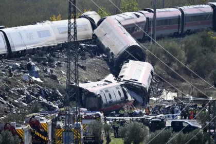 Emergency crews work at the site of a collision involving Renfe and Iryo high speed trains in Toledo province, Spain.