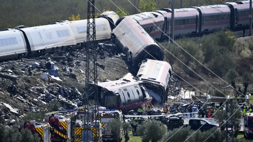 Emergency crews work at the site of a collision involving Renfe and Iryo high speed trains in Toledo province, Spain.