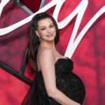Anne Hathaway attends the New York premiere of Verity in a black Prabal Gurung gown.