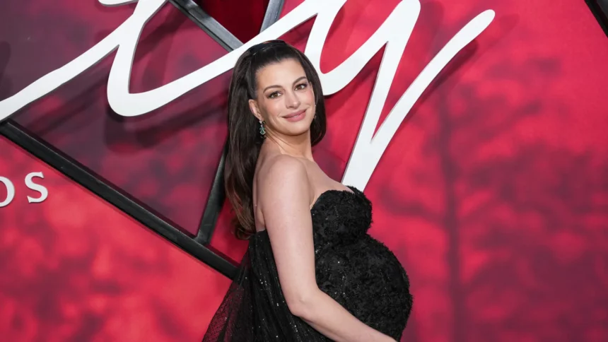 Anne Hathaway attends the New York premiere of Verity in a black Prabal Gurung gown.