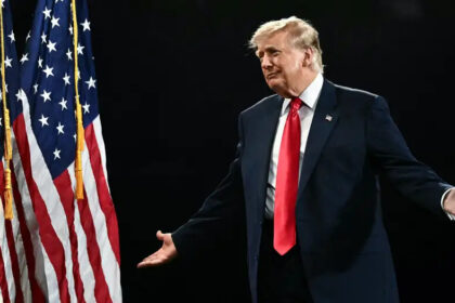 Donald Trump during a public appearance amid polling on voter support and presidential approval.