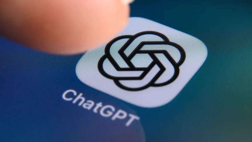 Illustration of a teenager using an AI chatbot with online safety symbols.