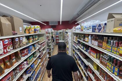 American shoppers buying groceries amid rising household expenses