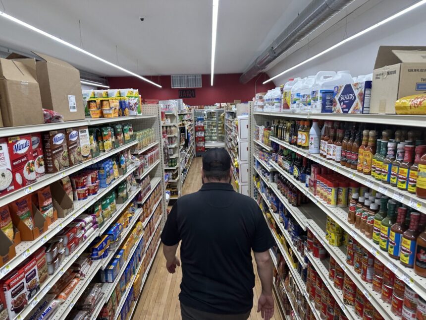 American shoppers buying groceries amid rising household expenses