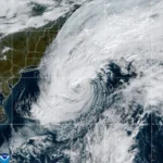 Satellite image showing Tropical Storm Vance over the Pacific Ocean, if confirmed by the image.