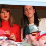 Tom Cruise and Taylor Swift watch the Kansas City Chiefs game at Arrowhead Stadium.