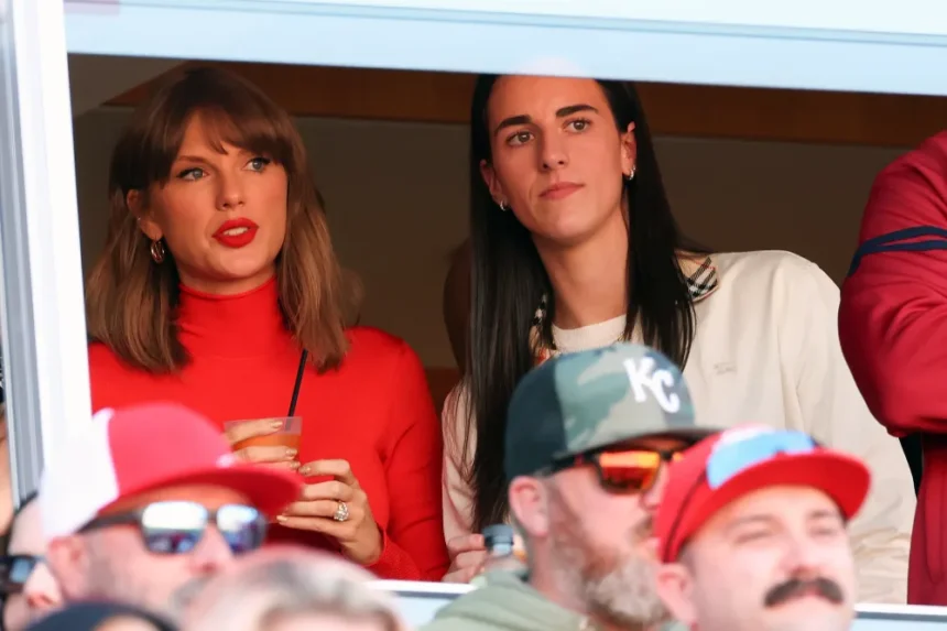 Tom Cruise and Taylor Swift watch the Kansas City Chiefs game at Arrowhead Stadium.