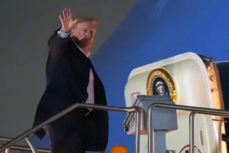 Donald Trump speaks at a campaign event as U.S. fuel prices and economic issues remain major news topics.