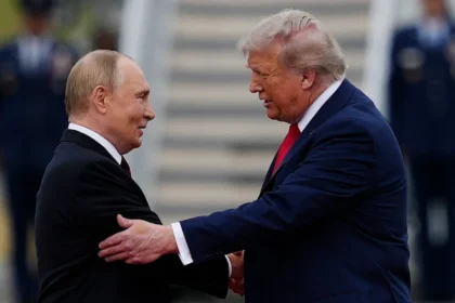 US President Donald Trump greets Russian President Vladimir Putin during a meeting in Alaska in August 2025.