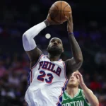 LeBron James playing for the Philadelphia 76ers against the New York Knicks.