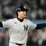 Yankees players react after their playoff elimination against the Rays