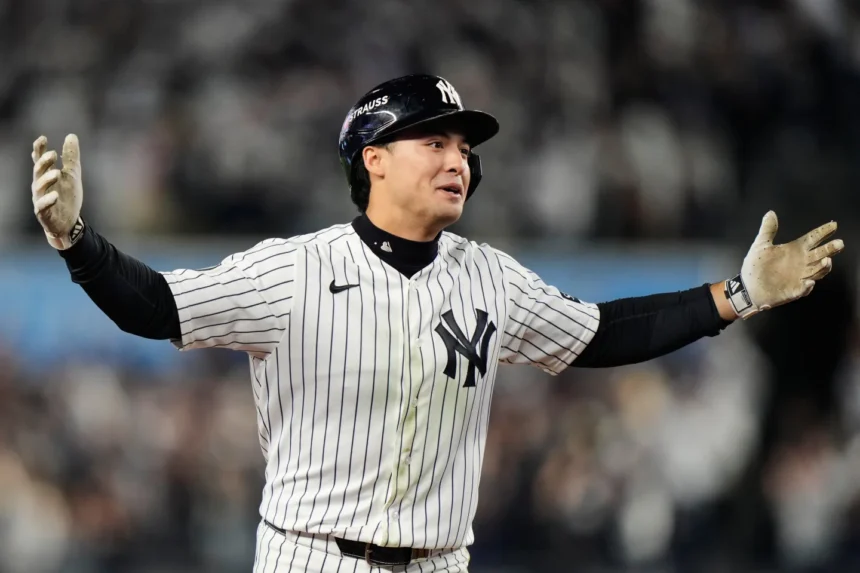 Yankees players react after their playoff elimination against the Rays