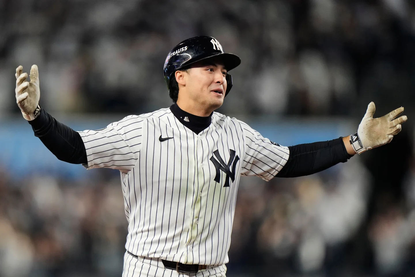 Yankees players react after their playoff elimination against the Rays